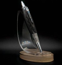 Laminated gray died birch.. Easy to assemble - an attention getter.