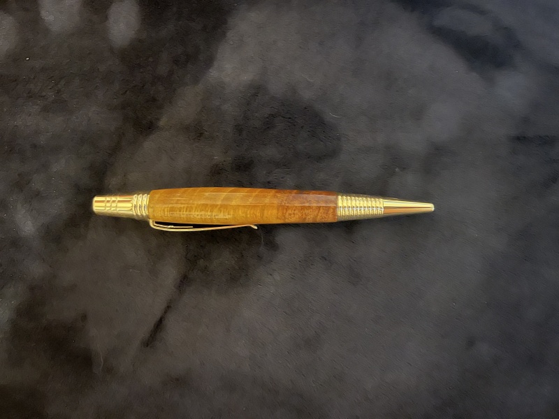 Osage Orange with PKM-7-G pen kit. Sunny Orange shimmers in the light. Excellent kit. Brass transmission parts instead of polyurethane - Well built!