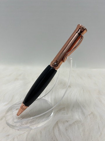 This is a PKM-4 Gunmetal Rosegold Ballpoint Twist Pen Kit featuring Beautiful Gaboon Ebony Wood with a C/A finish. Verfy nice pen kit that was easy to make. Highly recommend.