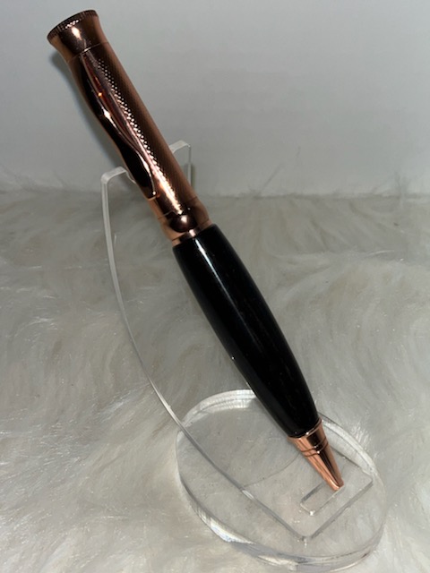 This is a PKM-4 Gunmetal Rosegold Ballpoint Twist Pen Kit featuring Beautiful Gaboon Ebony Wood with a C/A finish. Verfy nice pen kit that was easy to make. Highly recommend.