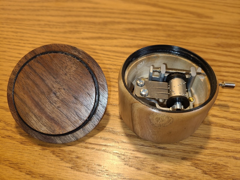 Oak, Walnut, and Meranti, each with a Kimiwo Nosete music box movement. My kids couldn't believe I had made them myself. The movements themselves feel well-made, and survived repeated mishandling as I tried to figure out how to make a lathe-turned box for them.