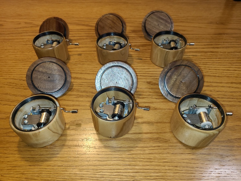 Oak, Walnut, and Meranti, each with a Kimiwo Nosete music box movement. My kids couldn't believe I had made them myself. The movements themselves feel well-made, and survived repeated mishandling as I tried to figure out how to make a lathe-turned box for them.