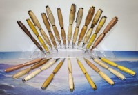 Having fun making lots of pens out of different woods.