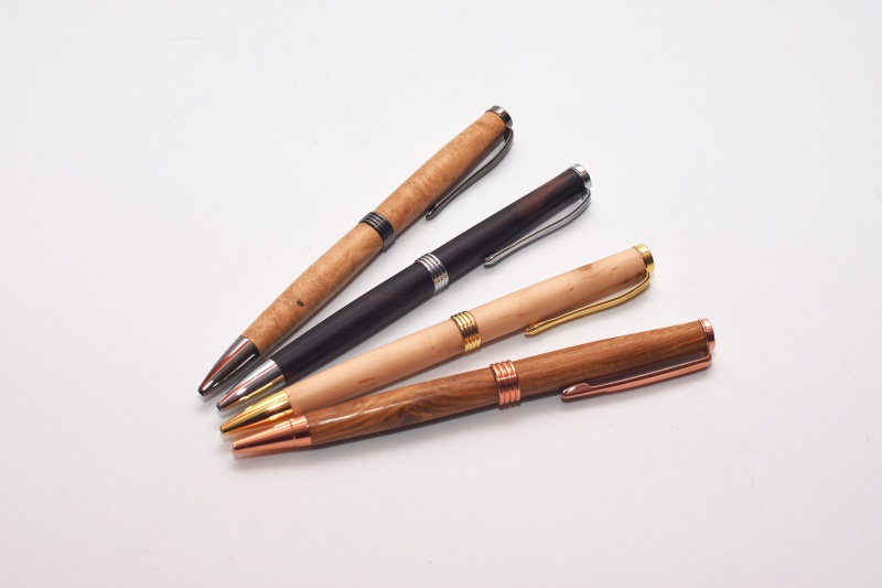 All 4 colours of this pen type in 4 different woods.