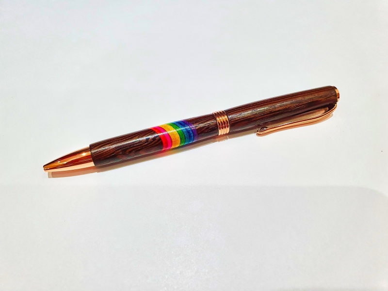 Wenge with rainbow of coloured Birch veneer.