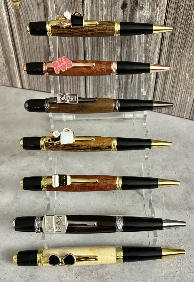 Displays multiple pens in a small space and allows customers to “feel and touch” them.